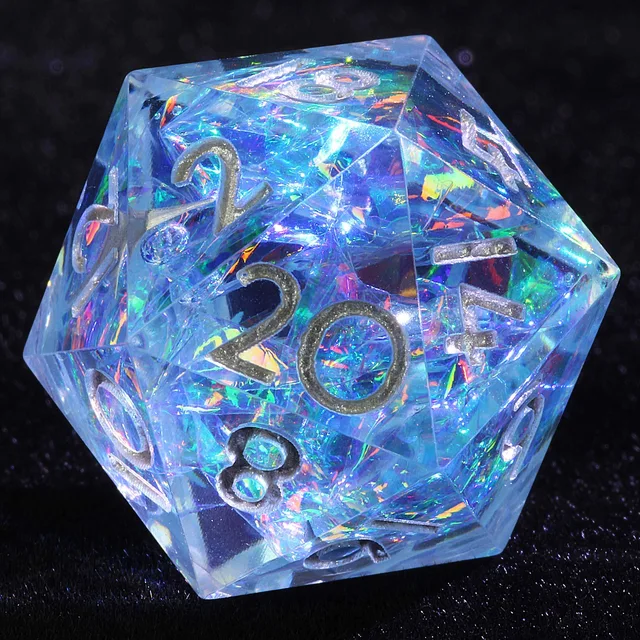 Close-up of a transparent pale-blue D20 with iridescent flecks and silver-coloured numbers.