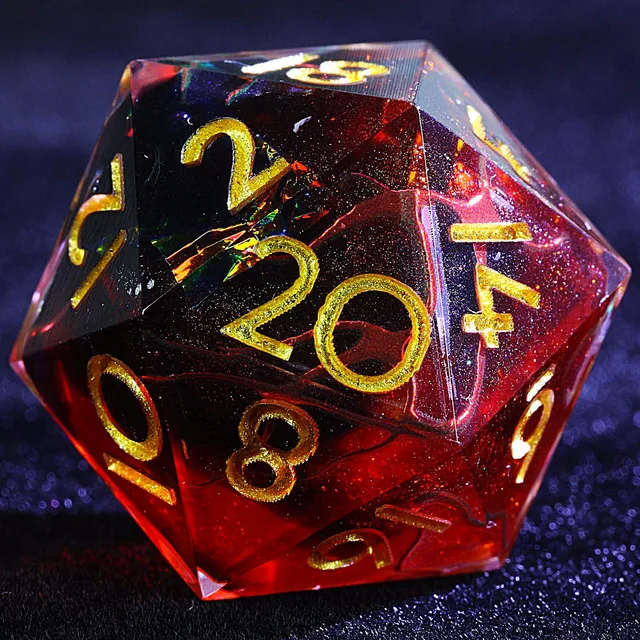Close-up of a translucent red and dark smoky D20 with gold numbers.