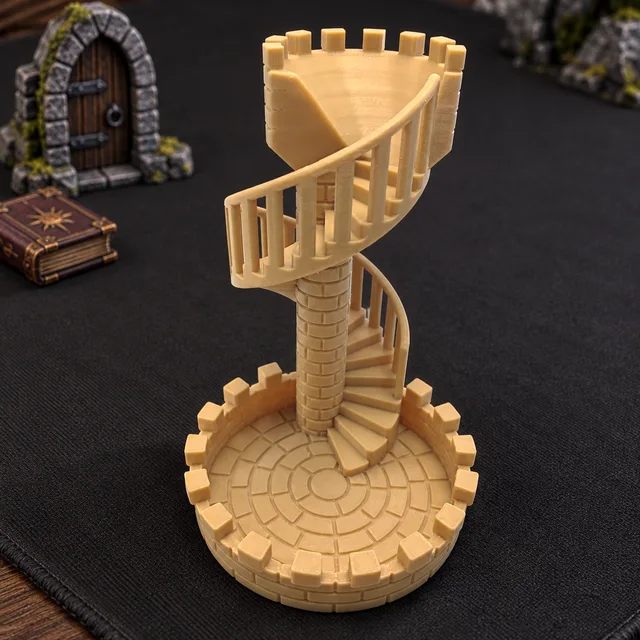 Latte-coloured dice tower with a brick-patterned column, railed spiral staircase and round crenellated tray.