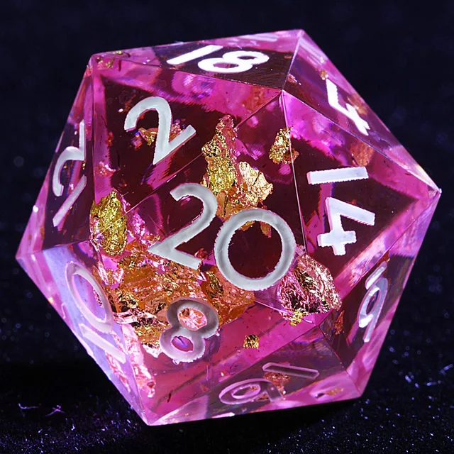 Close-up of a translucent pink and wine-red D20 with gold-coloured flecks and white numerals.
