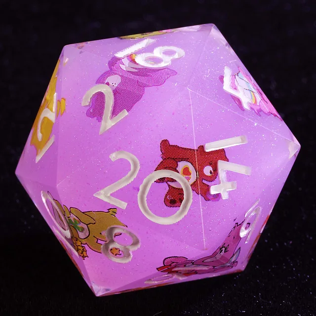 Close-up of a glittery pink-lavender D20 with white numerals and colourful bear illustrations.
