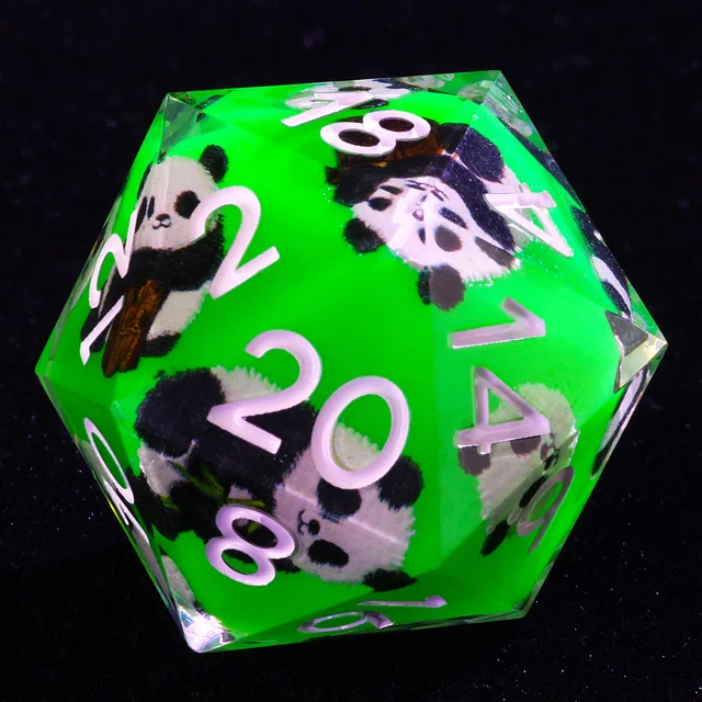 Close-up of green panda D20 with pale numerals and clear edges.