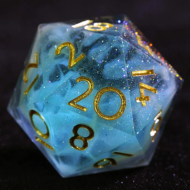 Close-up of a blue swirled, glitter-speckled D20 with gold numbers.