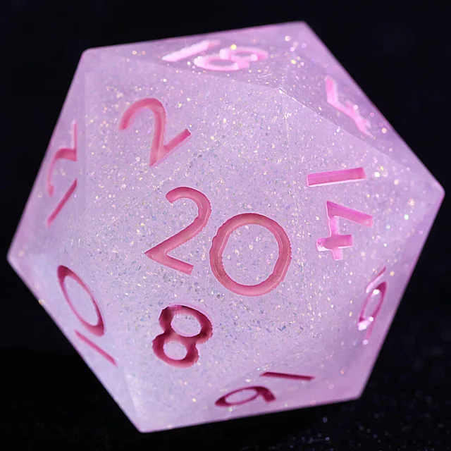 Close-up of a pale pink-lavender glitter D20 with pink numerals.