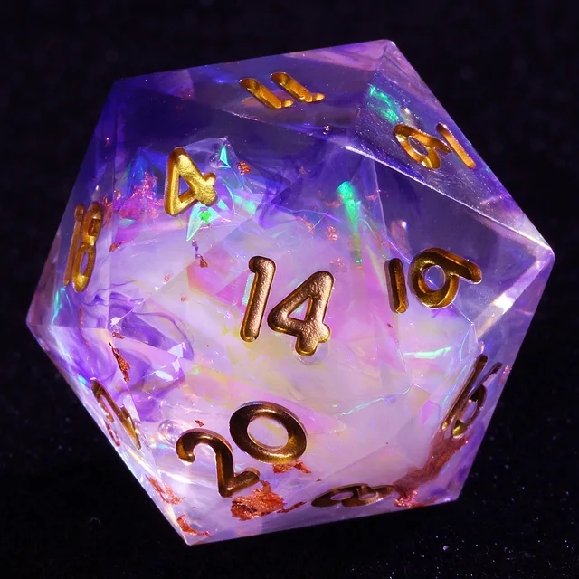 Close-up of a translucent purple and white D20 with gold numerals and gold-coloured flakes on black.
