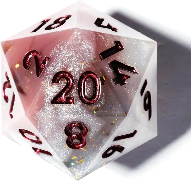 Close-up of a pink and pearly white D20 with burgundy numbers