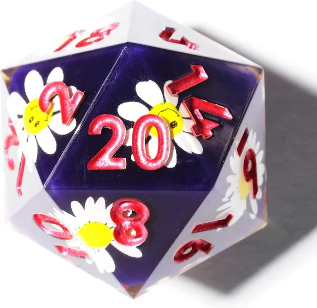 Close-up of a purple D20 with smiling daisies and pink-red numerals.