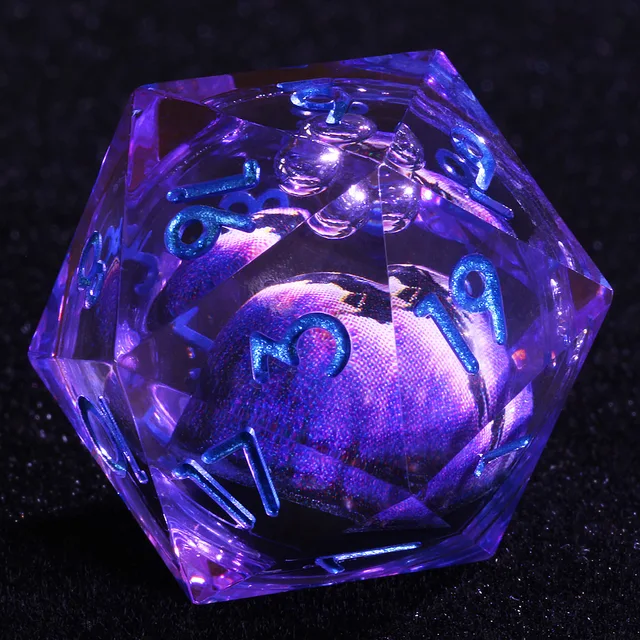 Close-up of a transparent purple D20 with blue numbers and a purple eye-like core.