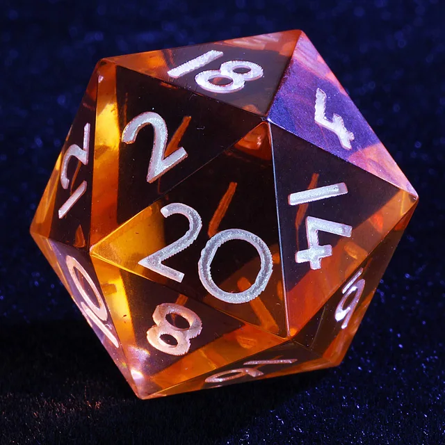 Close-up of a translucent orange D20 with white numerals.