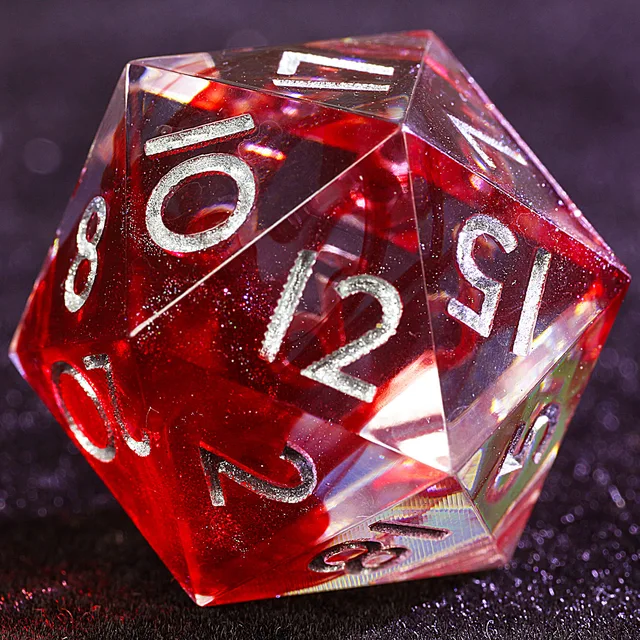 Close-up of a translucent red D20 with darker swirls, sparkle and silver numerals.