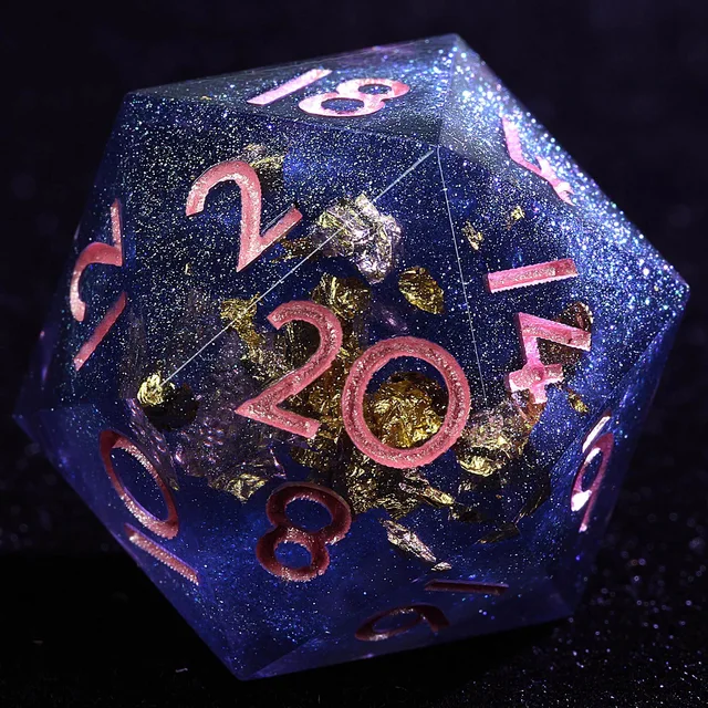 Close-up of a dark blue-purple glittering D20 with gold-coloured flecks and pink-copper numerals.