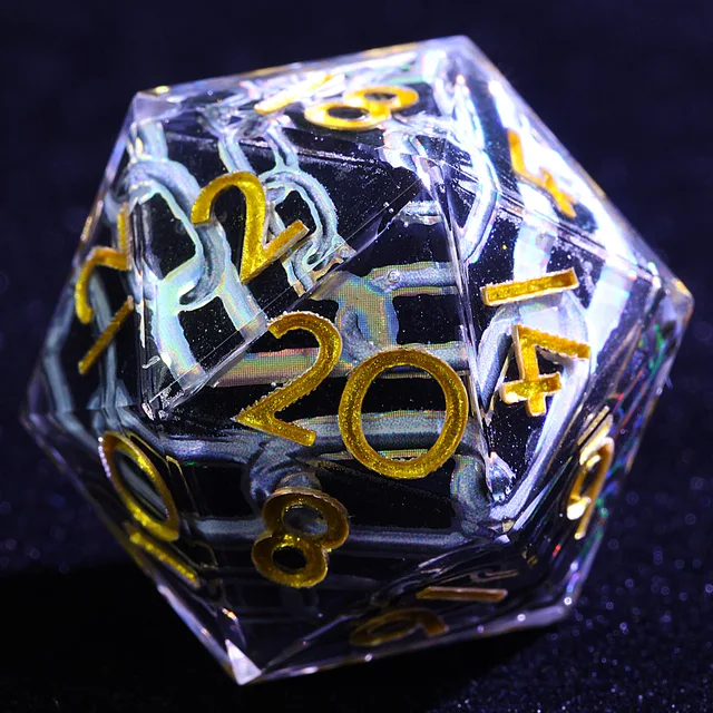 Close-up of a clear D20 with gold numbers and an iridescent chain pattern.