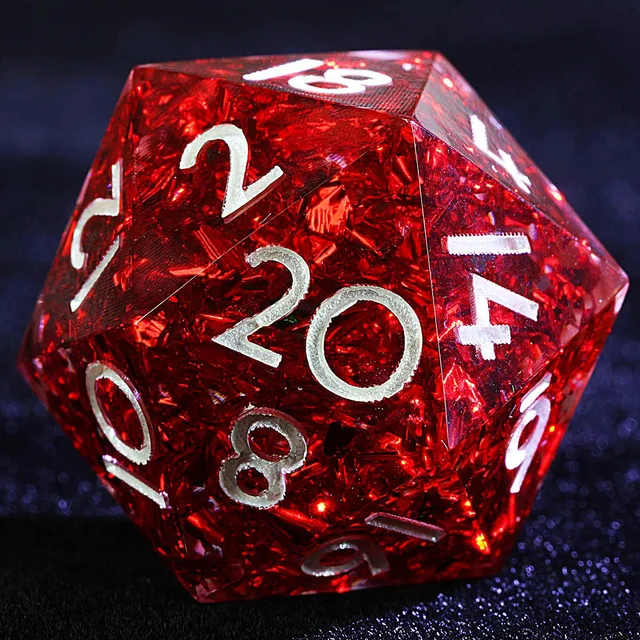 Close-up of a crimson foil-filled D20 with pale numerals.