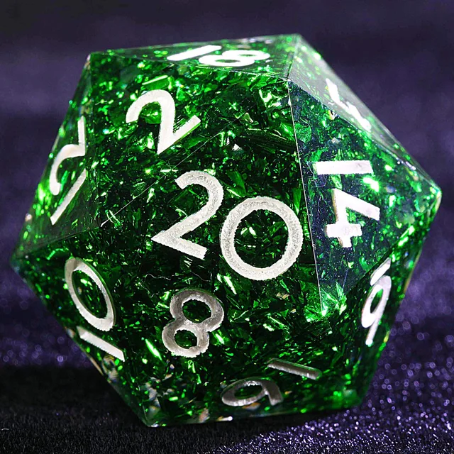 Close-up of a green foil D20 with pale numerals.