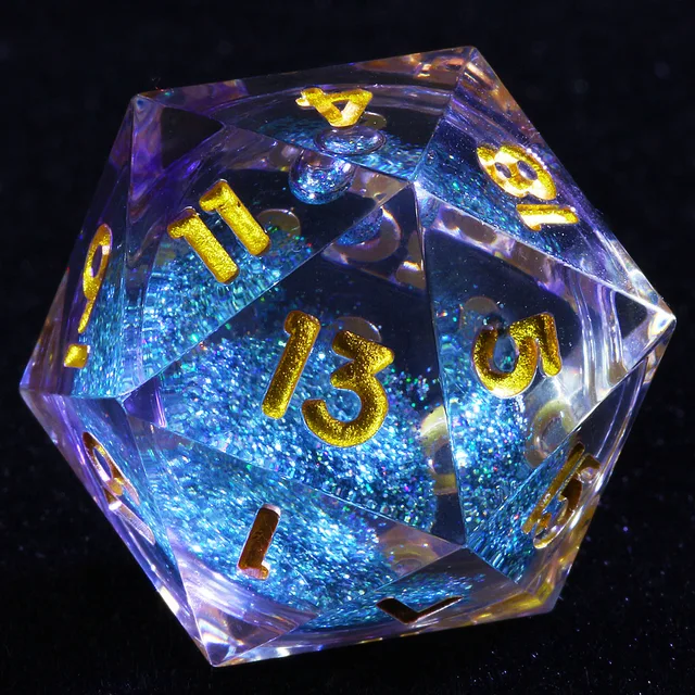Close-up of a clear purple-tinted D20 with a blue glitter core and gold numbers on black.