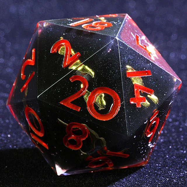 Close-up of a dark glitter-filled D20 with red numerals and gold accents.