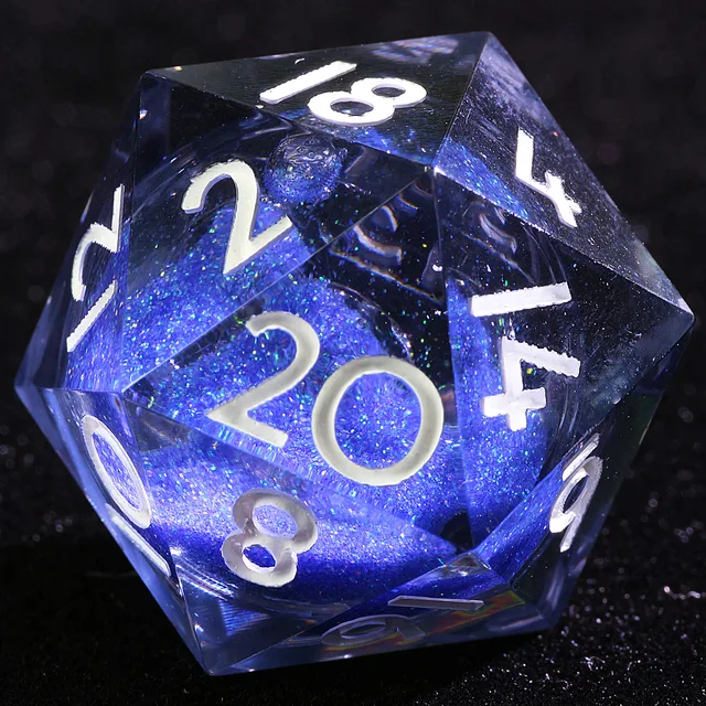 Close-up of a clear D20 with white numbers and a glittering blue core.