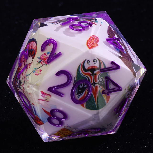 Close-up of a pale D20 with raised purple numbers and multicoloured opera-mask artwork.