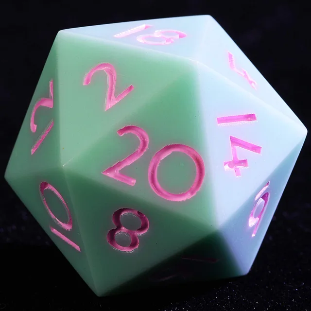 Close-up of the pale blue and mint-green D20 with pink numerals.