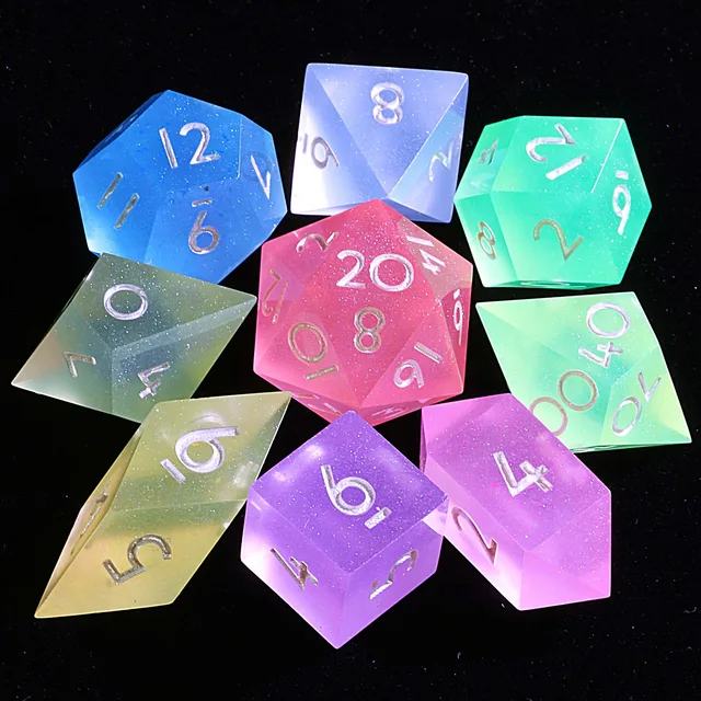 Nine-piece resin dice set with a D4, two D6, a D8, a D10, a percentile die, two D12 and a D20.